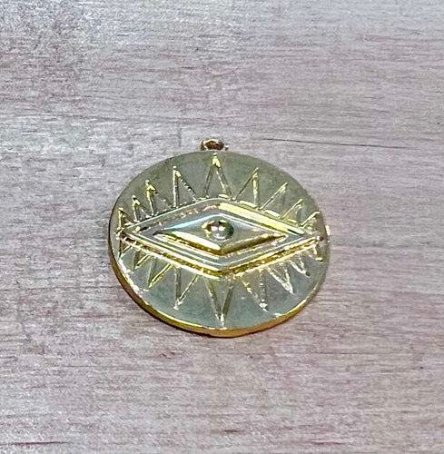 Large charm with an evil eye etched 
