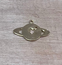 Load image into Gallery viewer, Saturn planet charm with cut out stars in plated gold