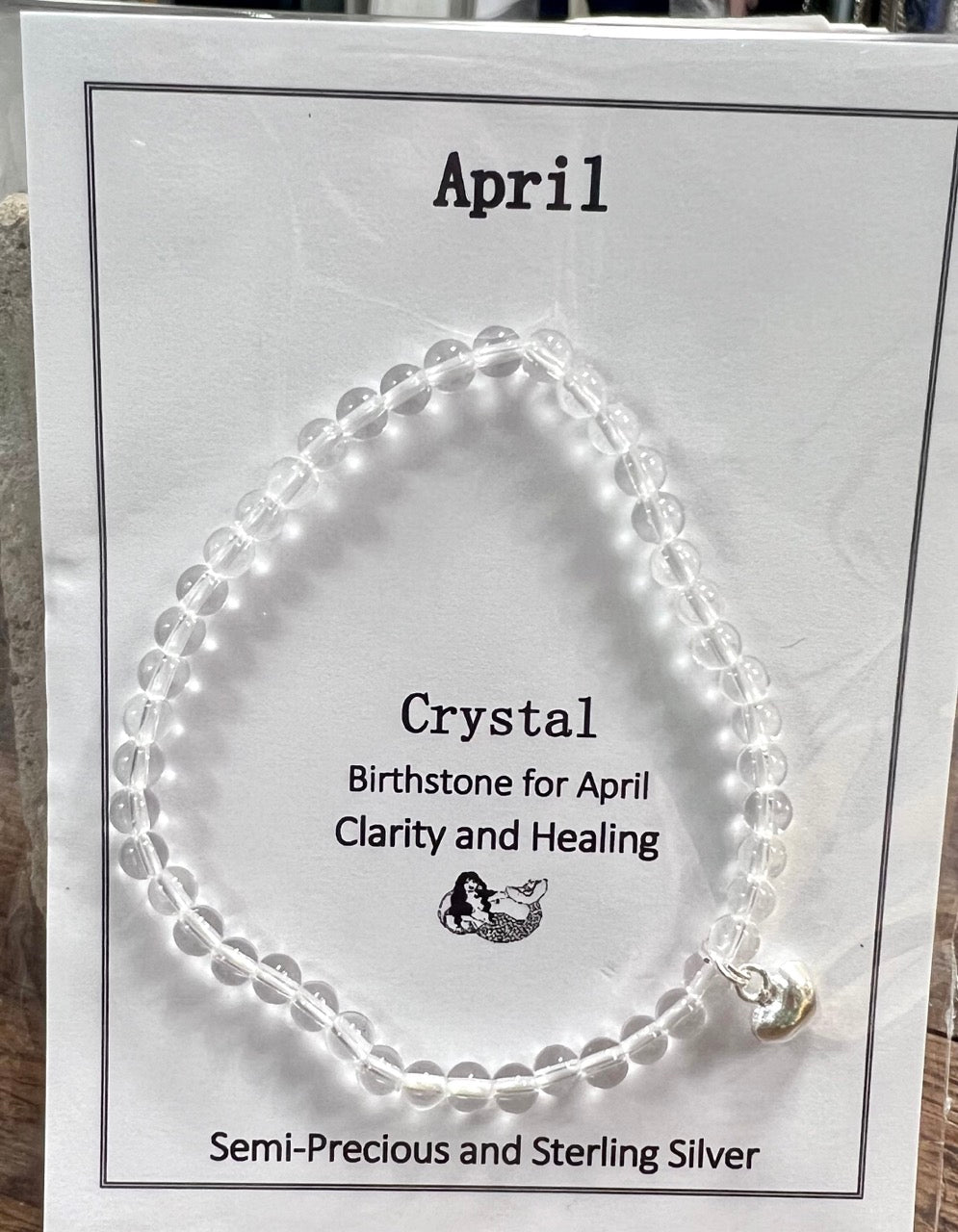 April birthstone bracelet - small clear quartz beads with a sterling silver heart