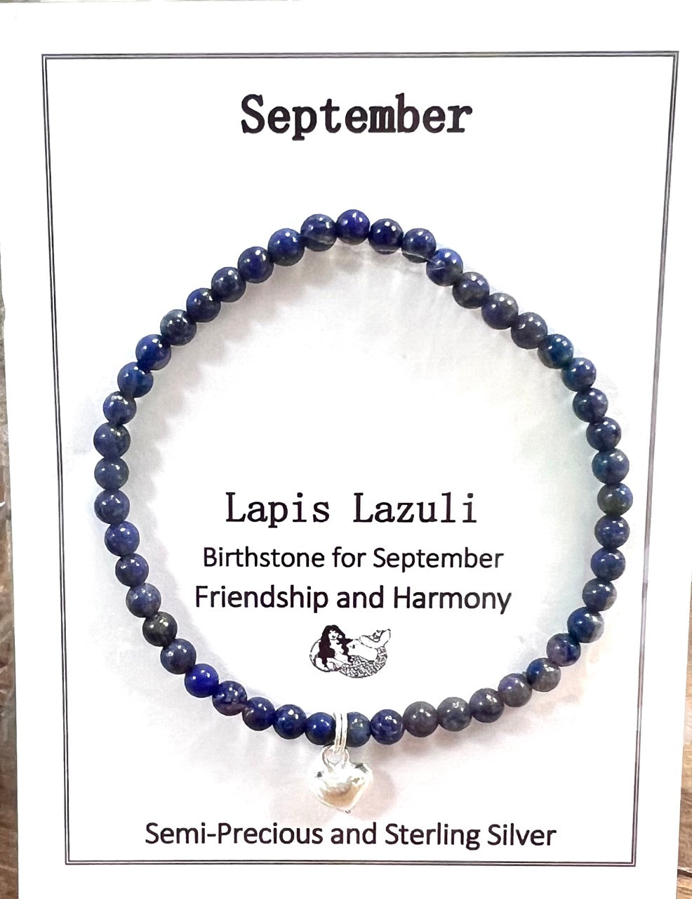 September birthstone bracelet with lapis lazuli beads and  a sterling silver heart