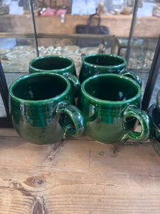 Tamegroute pottery mugs in the classic dark green