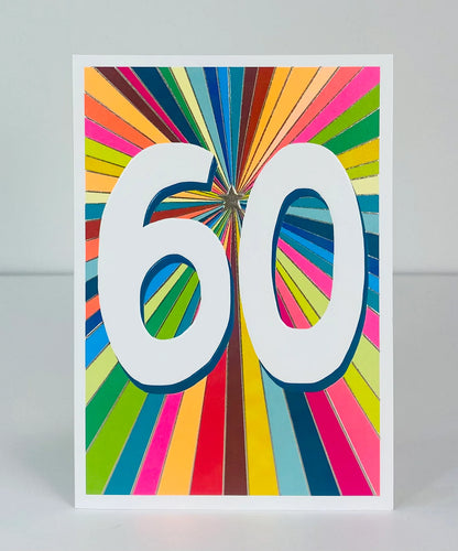 60 birthday card - large white numbers with a small gold star and neon rainbow in a multitude of colours