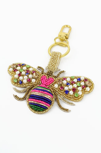 Keyring - The body of the bee has striped of blue, pink and green beads interspersed with gold. The wings are made from pearls and pink, blue and green crystals.