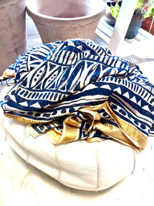 Navy block printed fish design scarf with a woven gold edge. 100% cotton