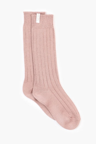 A long wide rib sock in blush made of mostly natural fabric
