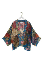 Load image into Gallery viewer, Colourful bouquets of flowers on a teal background on a classic kimono shape top