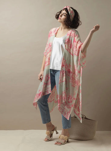 Loose mid-length kimono in pinks and olive on cream with images of Ancient Rome and Greece