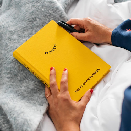 The bright yellow planner -your first step on your wellbeing journey