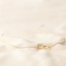 Load image into Gallery viewer, Brushed gold interlocking hoop necklace