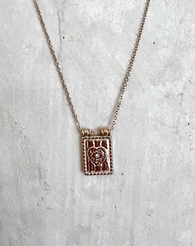 Rectangular pendant with a heart and central cubic zirconia 