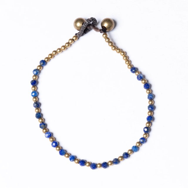 Lapis lazuli crystal beads with brass beads creating a beautiful birthstone or healing bracelet