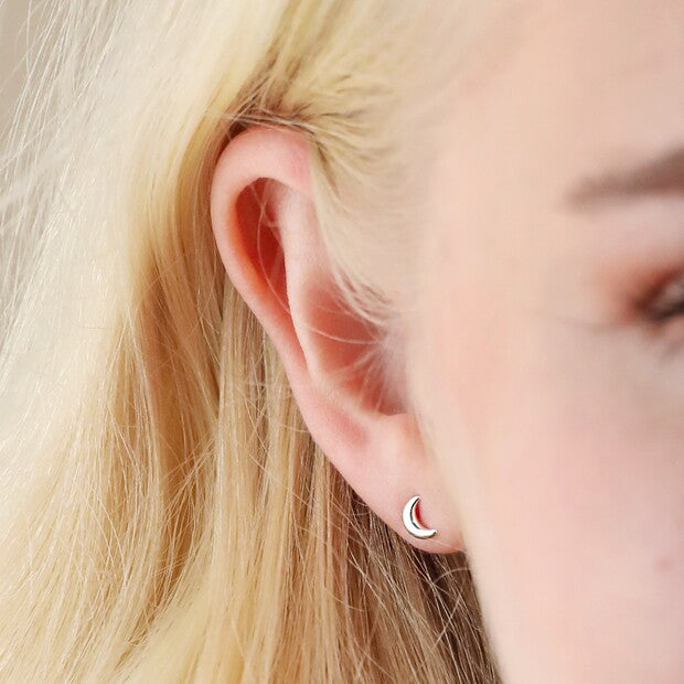 Tiny silver moon earrings