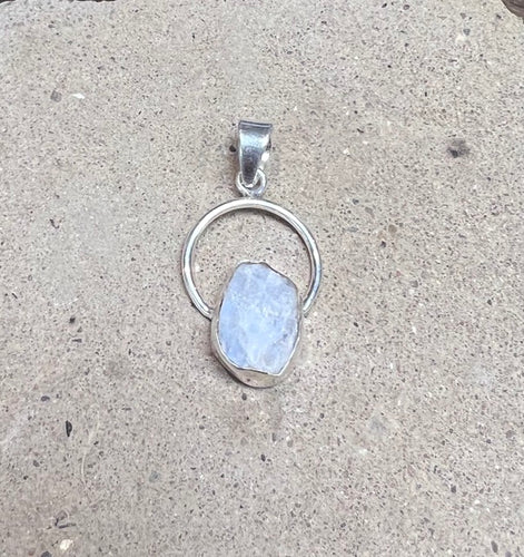 White quartz rough shaped pendant in a sterling silver setting