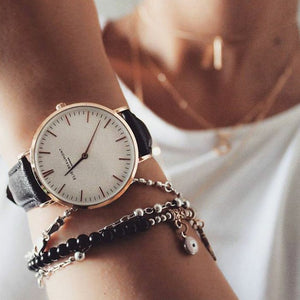 Classic watch with black strap