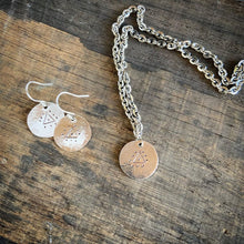Load image into Gallery viewer, Protection disc earrings inspired by Moroccan Berber designs in sterling silver.