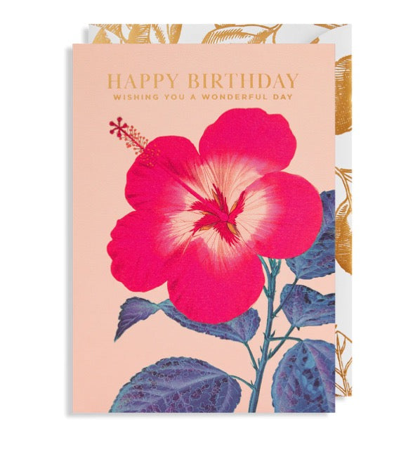 A birthday card with a large pink flower and Happy Birthday wishing you a wonderful day