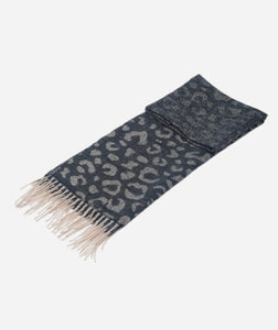 A lightweight and supersoft ladies scarf, featuring a black ombre design. With a large leopard print to one end, it gently fades to a plain design to the other end. With warm cream tassels to each end.