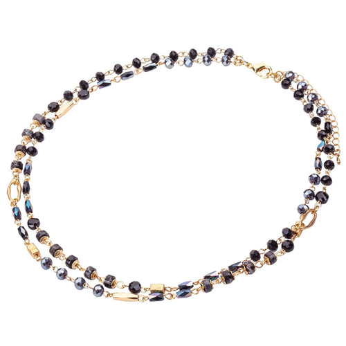 Short crystal beaded necklace with black gem stones on a gold chain.