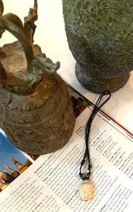 Buddha head necklace on adjustable cord