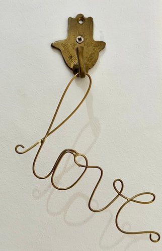 LOVE a handmade sign made from brass wire. perfect to hang or sit on a shelf