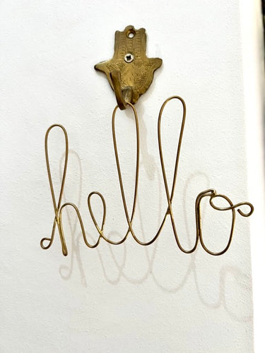 Hello wire brass word for hanging or sitting on a shelf. Handmade in Morocco