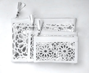 White and silver arabic cut purses