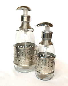Glass soap dispenser with silver detail