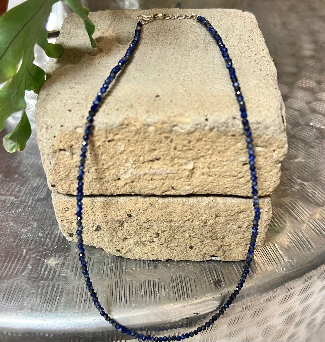 Short necklace made up of tiny lapis lazuli with sterling silver closure 