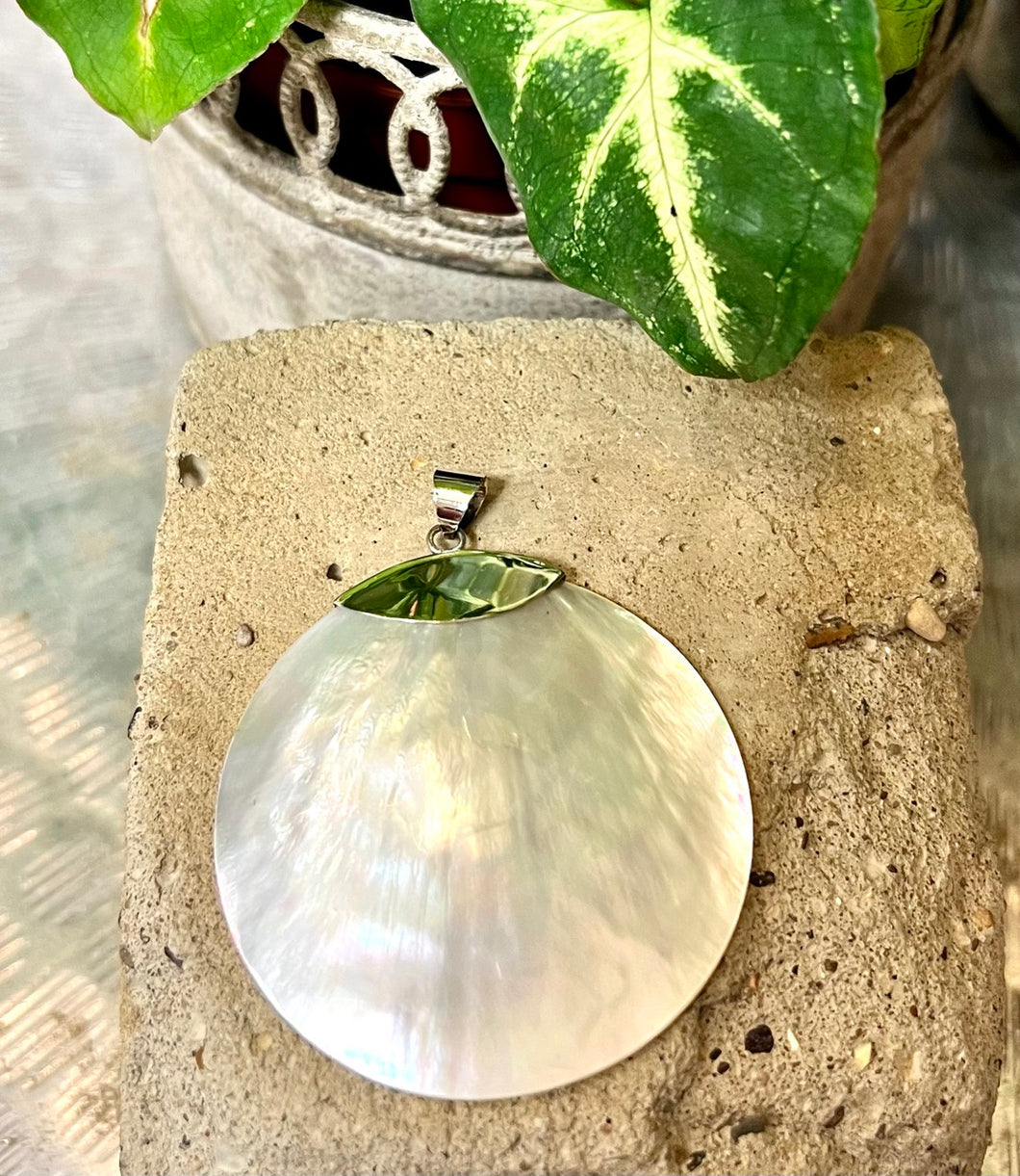 Mother of pearl large circular pendant on sterling silver
