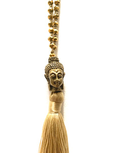 Gold beaded necklace with Buddha