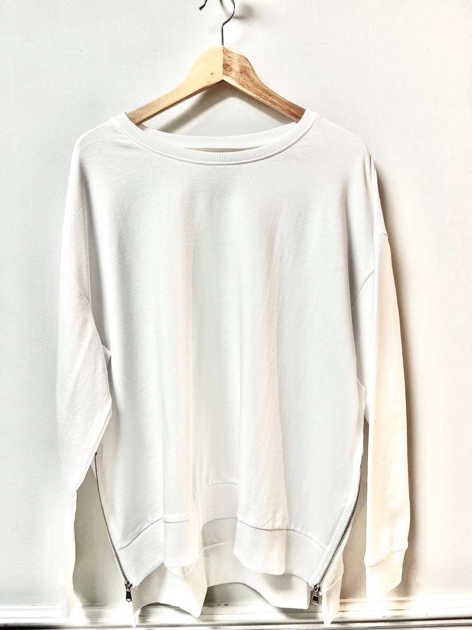 White sweatshirt with side zips