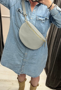 Large Leather crossbody half moon bag in pale grey at BE Lifestyle Boutique
