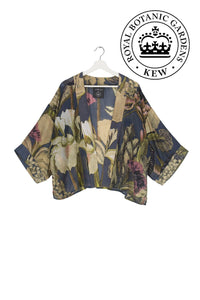 A blue short kimono with images of iris with touches of khaki and soft pink