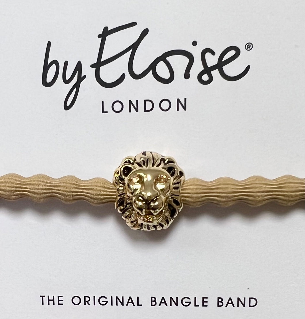  A camel elastic hair band with a gold lion's head, sparkly citrine piercing eyes and a wild mane!