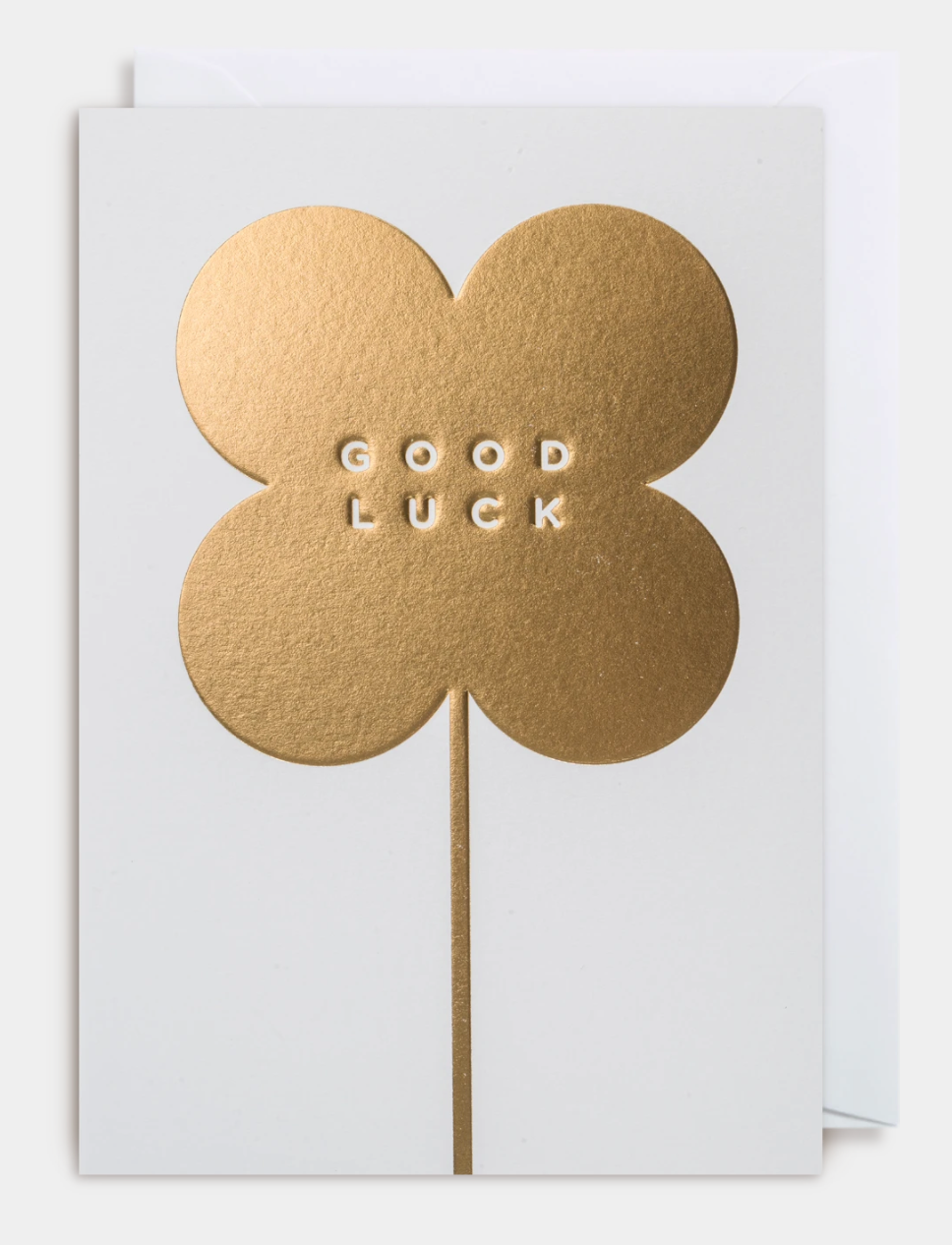 Good Luck card. A gold four leaved clover with good luck