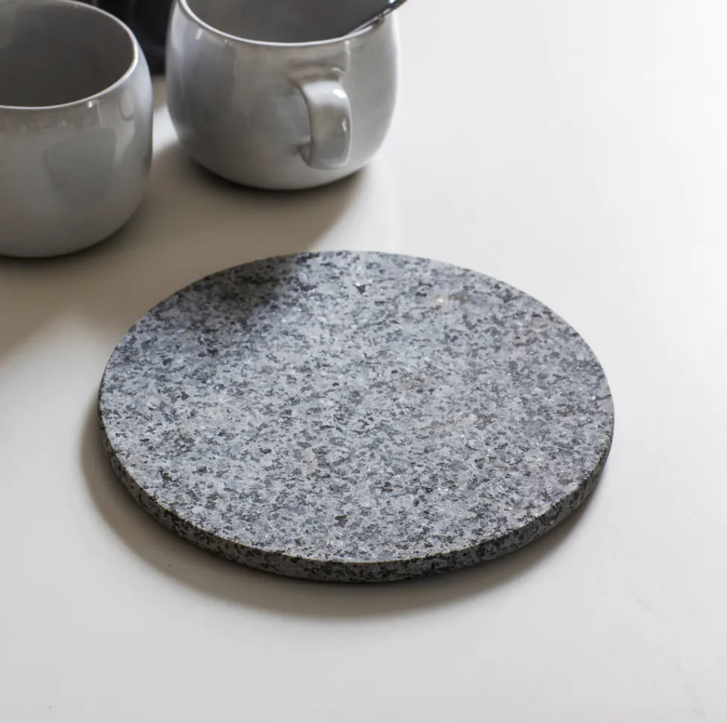 round trivet made from granite 20 x 20 cm