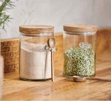 Load image into Gallery viewer, Glass storage jars with mango lids and a mango spoon. Sustainable living jars