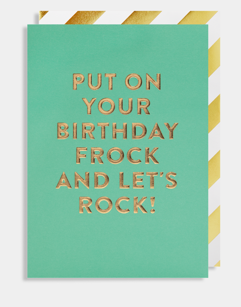 Turquoise card with bold gold writing 