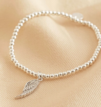 Load image into Gallery viewer, Delicate beaded silver bracelet with a small angel wing
