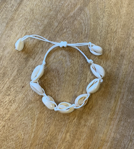 Shell bracelet on white cord