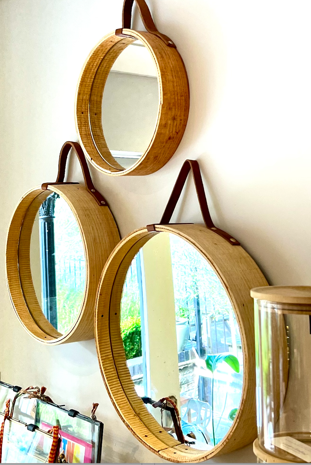 Round rustic mirrors made with wood and leather