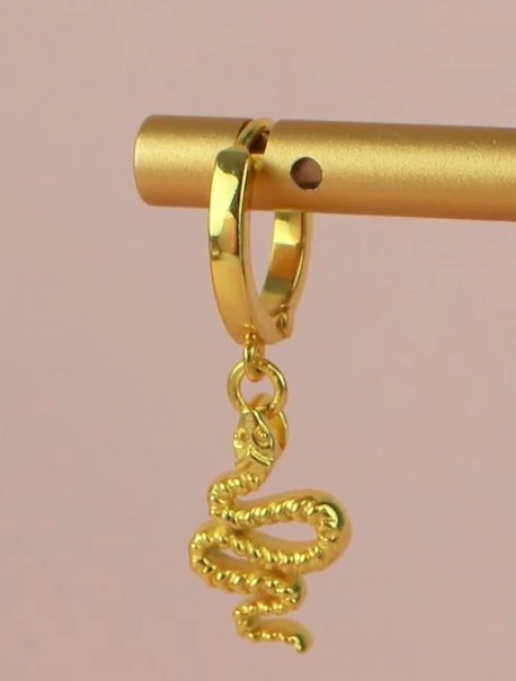 A huggie earring with a dangly snake - brass with a 22 ct gold plate.