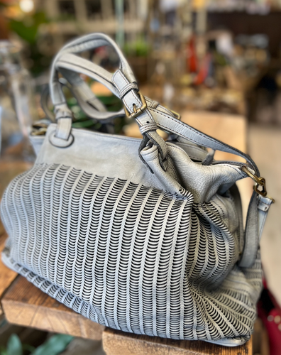A light grey punch pattern Italian Leather  Handbag