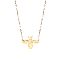 Load image into Gallery viewer, A handout and hammered brass bee on a gold plated chain.