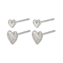 Load image into Gallery viewer, A set of two larger silver heart studs and two smaller ones with a n organic uneven surface