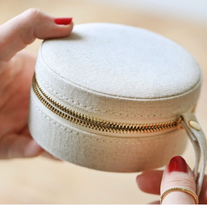 Natural coloured round linen jewellery case 