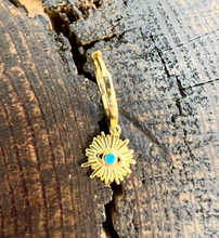 Load image into Gallery viewer, A gold sun  with a small eye in the centre with a small turquoise gem