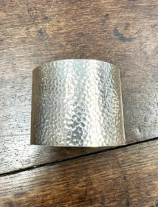 Hammered sterling silver cuff with a textured surface width 5 cm