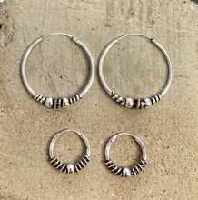 Load image into Gallery viewer, Sterling silver hoops with tribal detail 