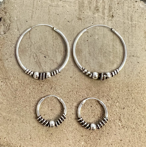 Sterling silver hoops with tribal detail 